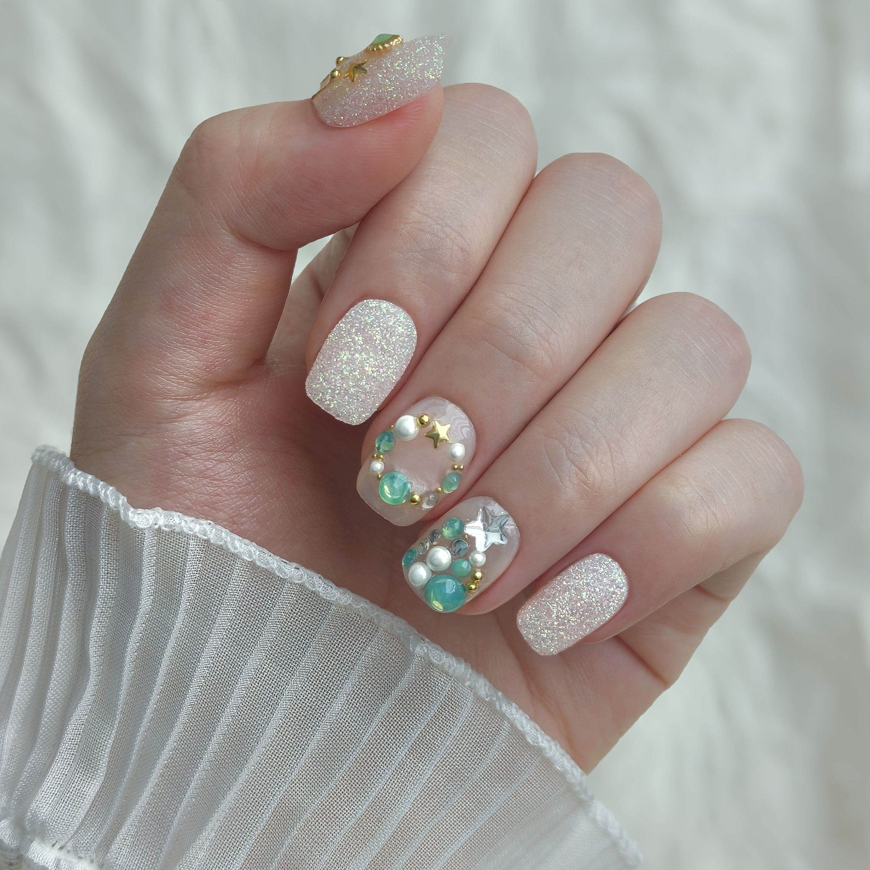 short round christmas nails with hristmas tree decorations